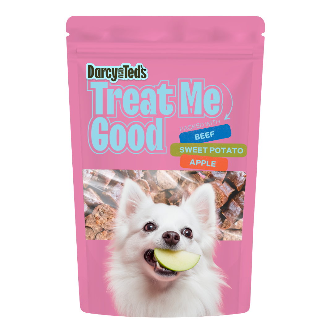 Pink Beef Treats dog treat package with a white dog holding a green apple