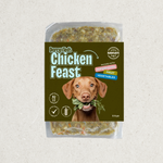 Dog food package labeled 'Chicken Feast' with a dog holding a leaf on a textured gray background